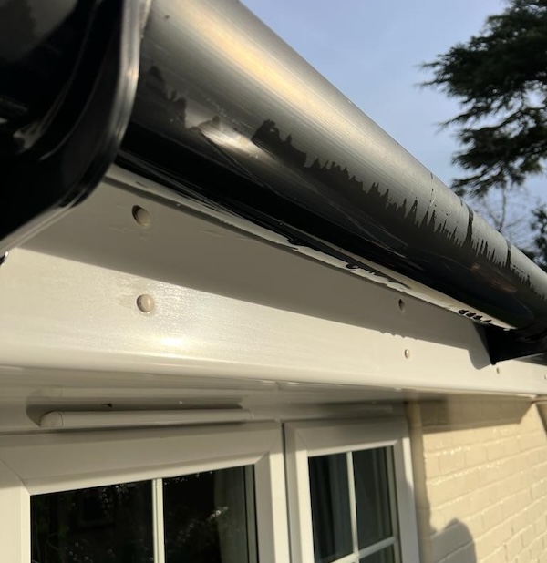 Freshly cleaned UPVC piping on roof